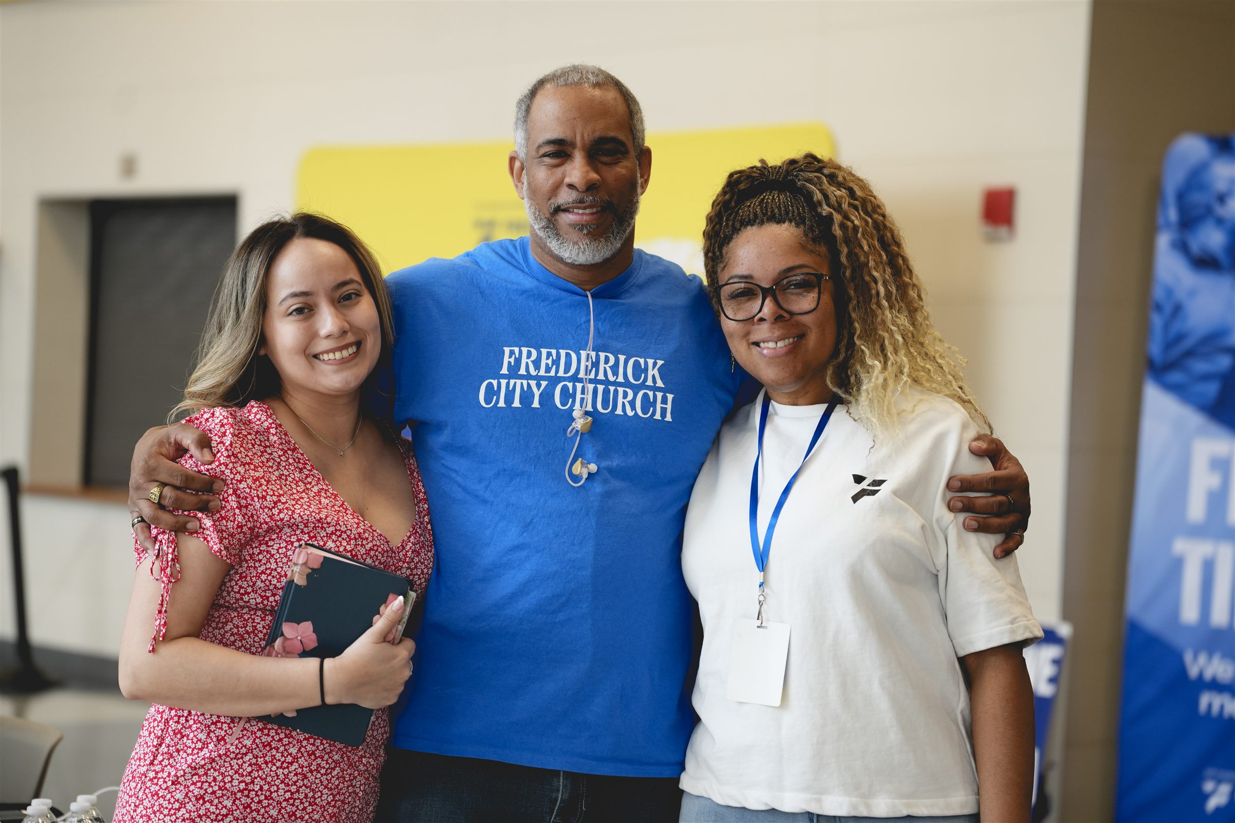 Members embracing warmly at Frederick City Church