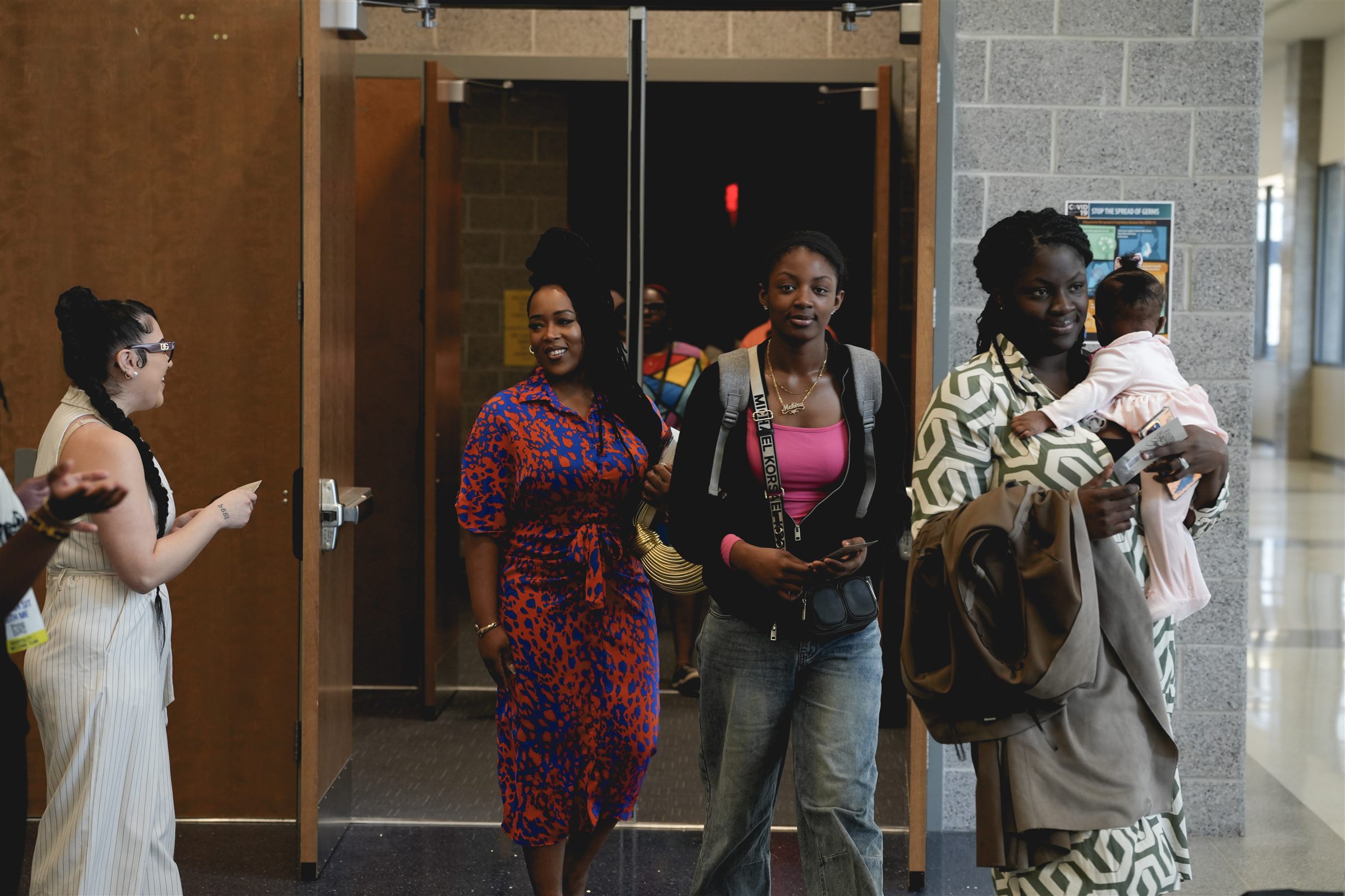 Members being welcomed at the door