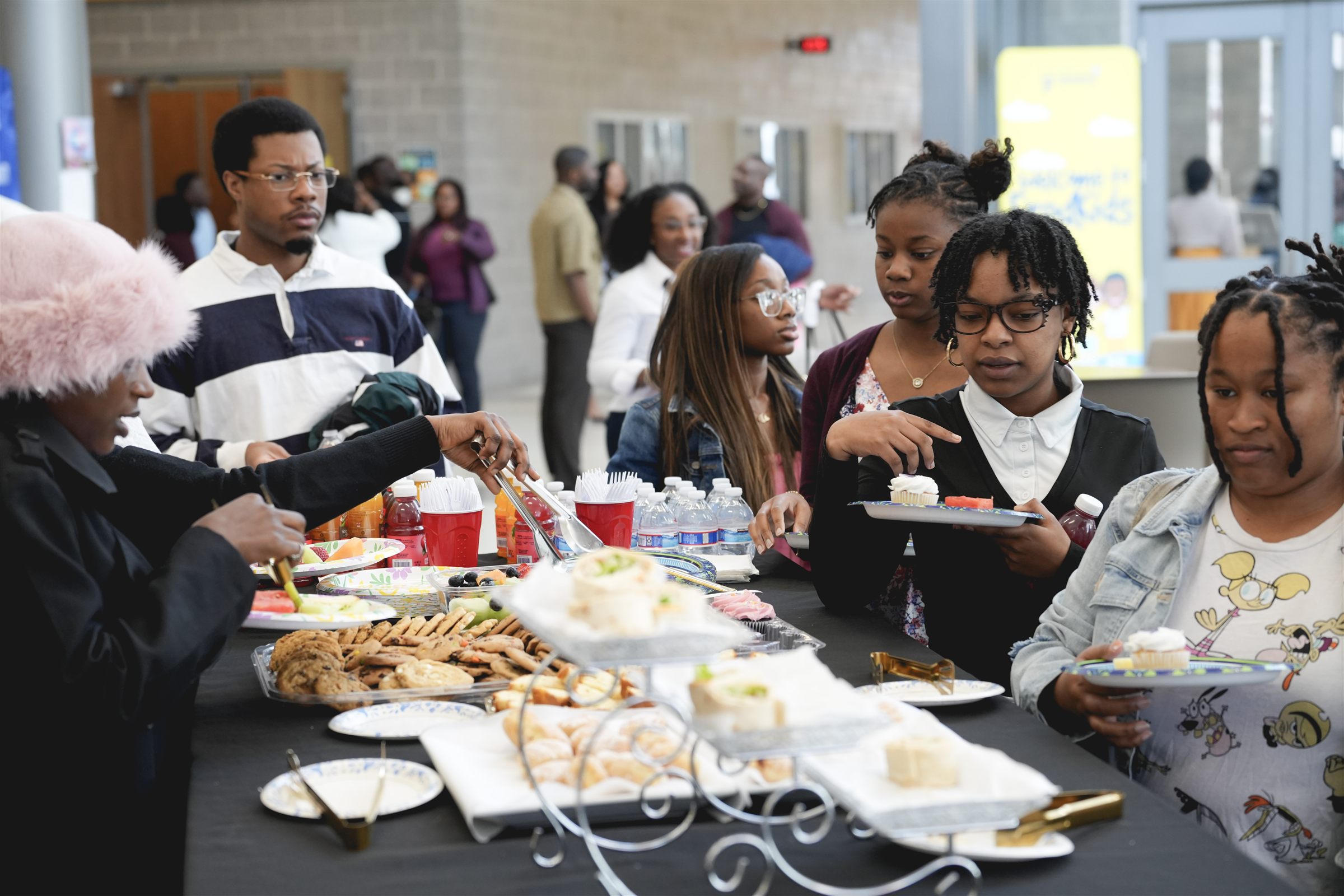 Teens and young adults at the fellowship table