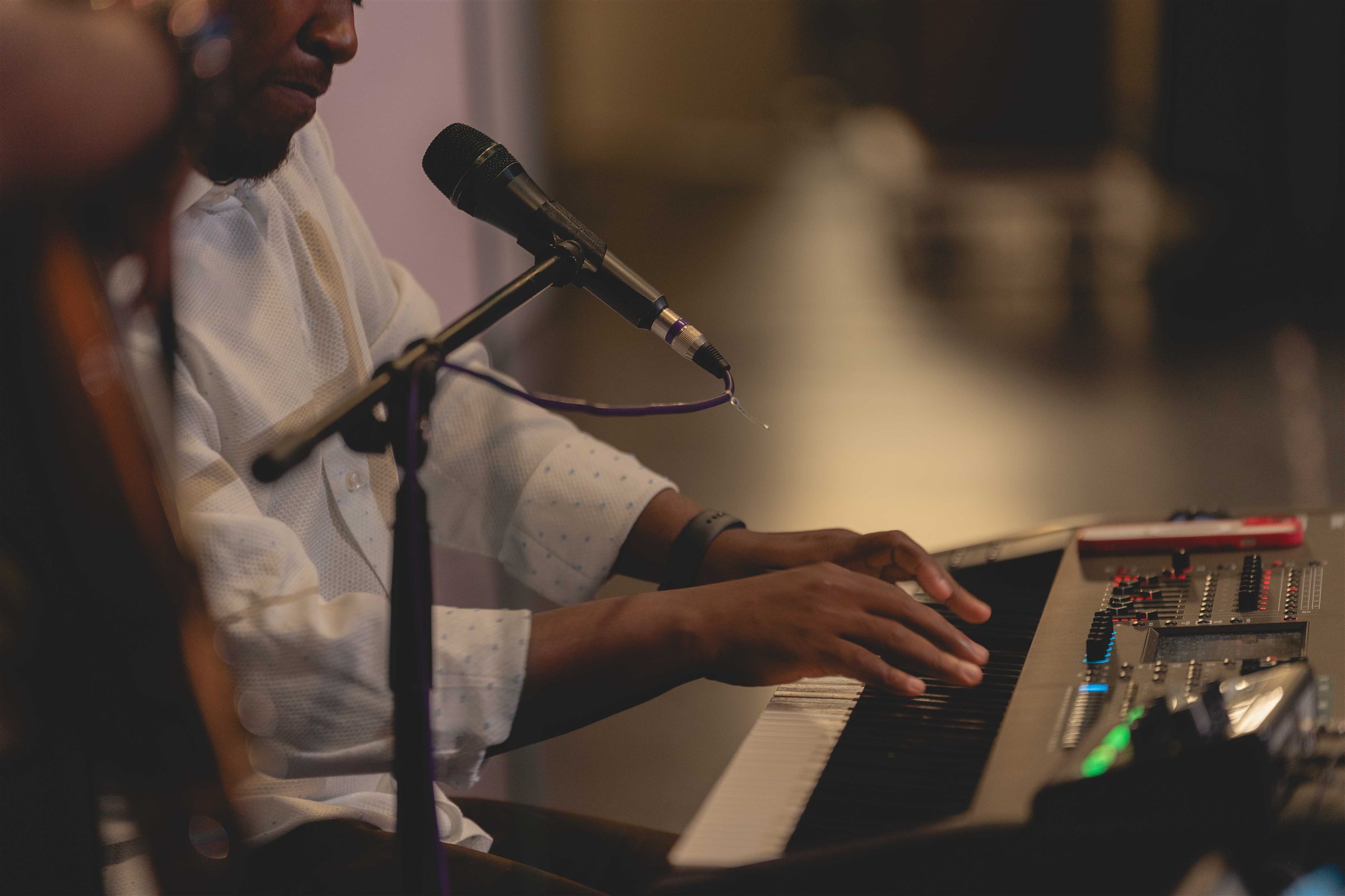 A musician playing keyboard